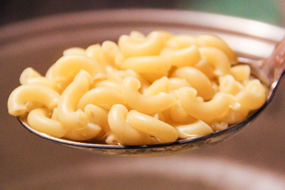 Cooked Pasta on a Spoon