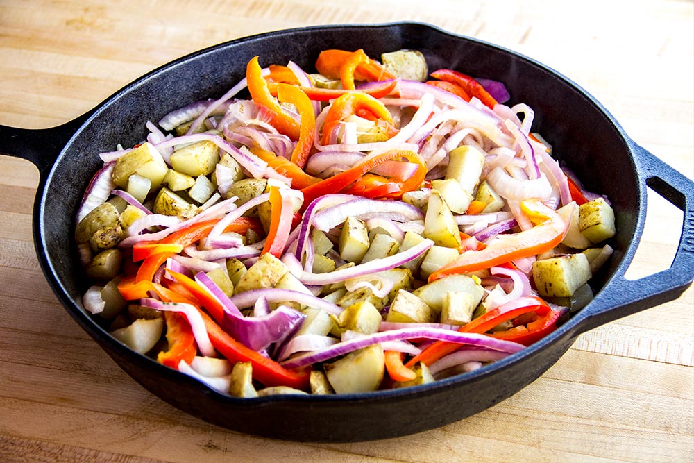 Adding Potatoes to Cast Iron Skillet