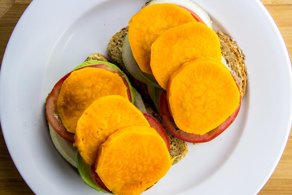 Adding Sweet Potato Slices to Sandwich