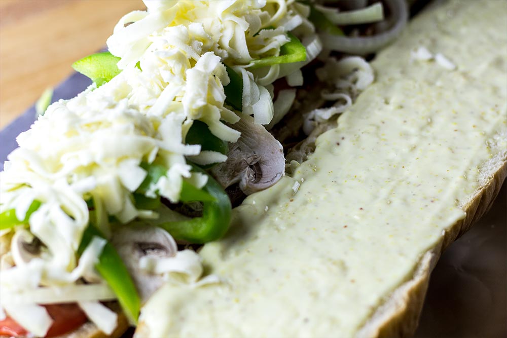 Adding Mozzarella Cheese to Sandwich