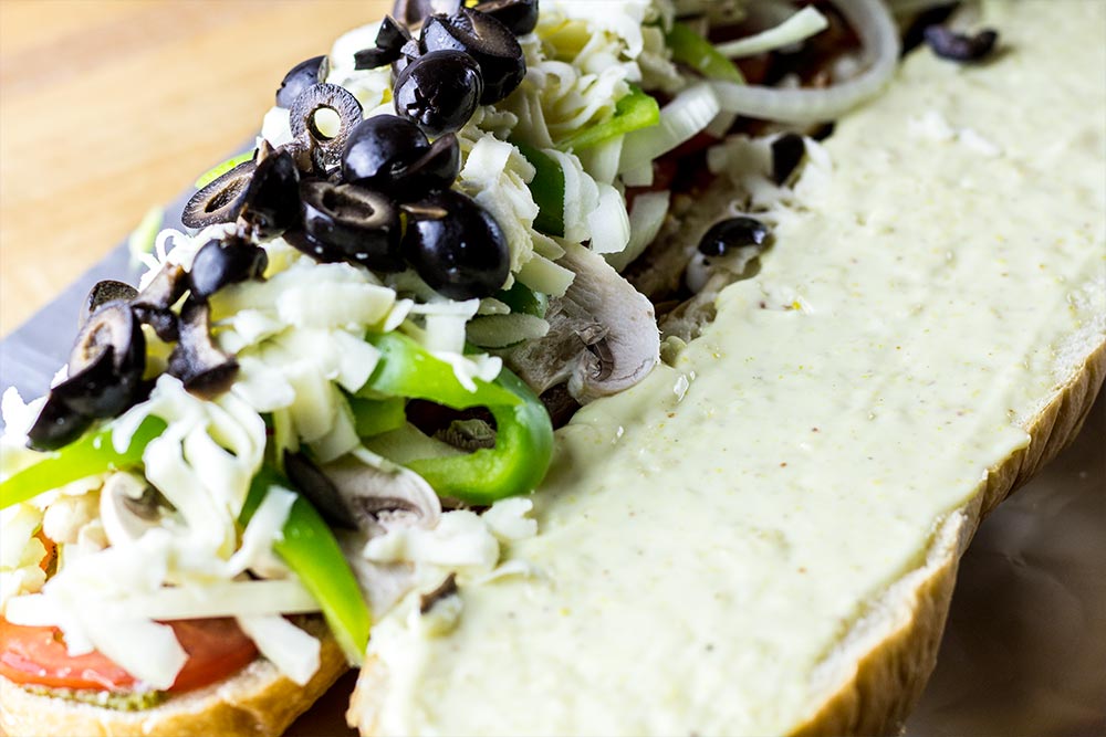 Adding Black Olives to Sandwich