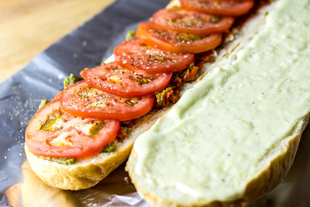 Adding Tomatoes to Sandwich