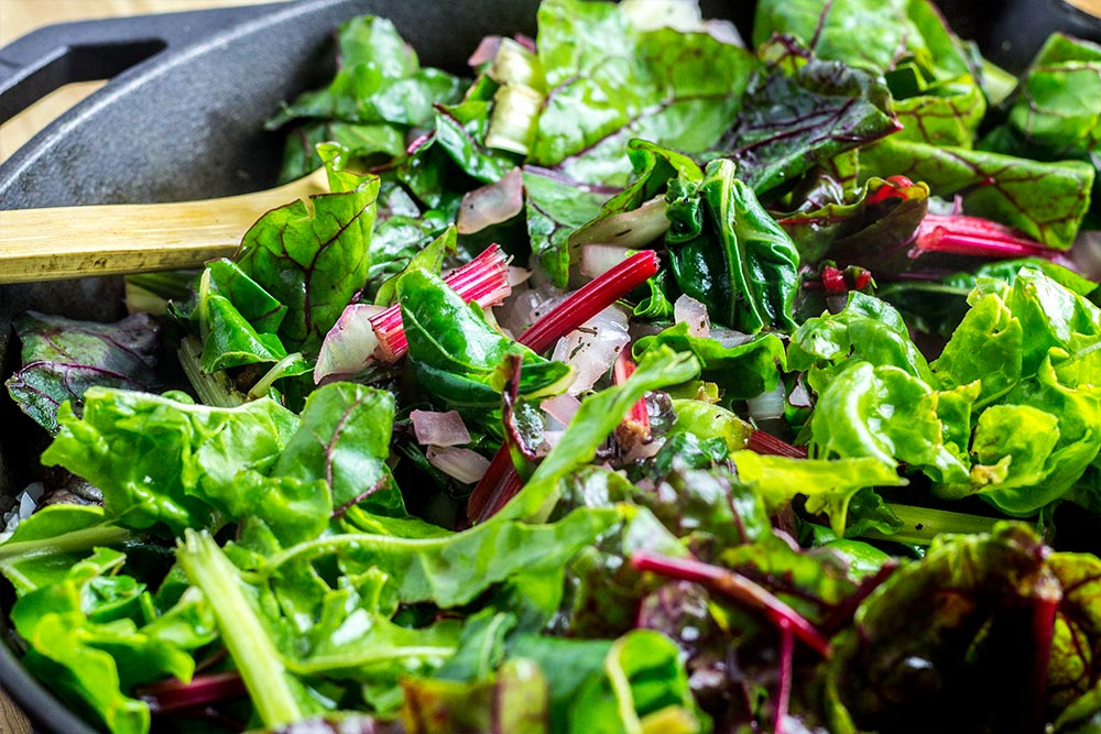 Cooking Down Swiss Chard in Skillet