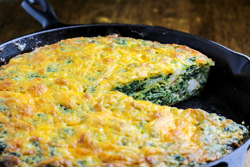 Piece of Cornbread & Shrimp Cut From Skillet