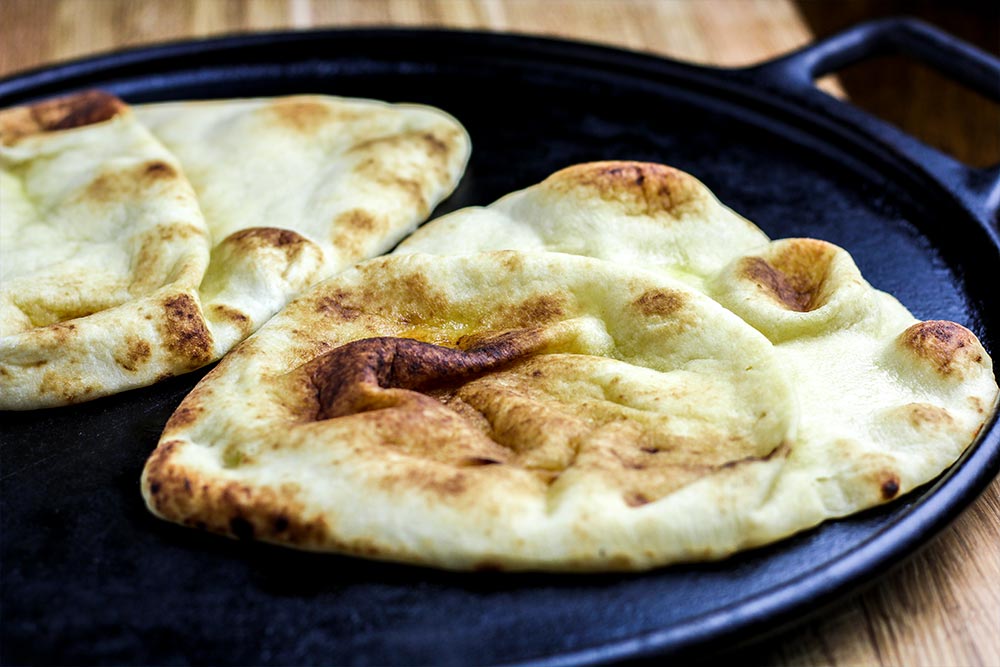 Naan Flatbread on Cast Iron Pizza Tray