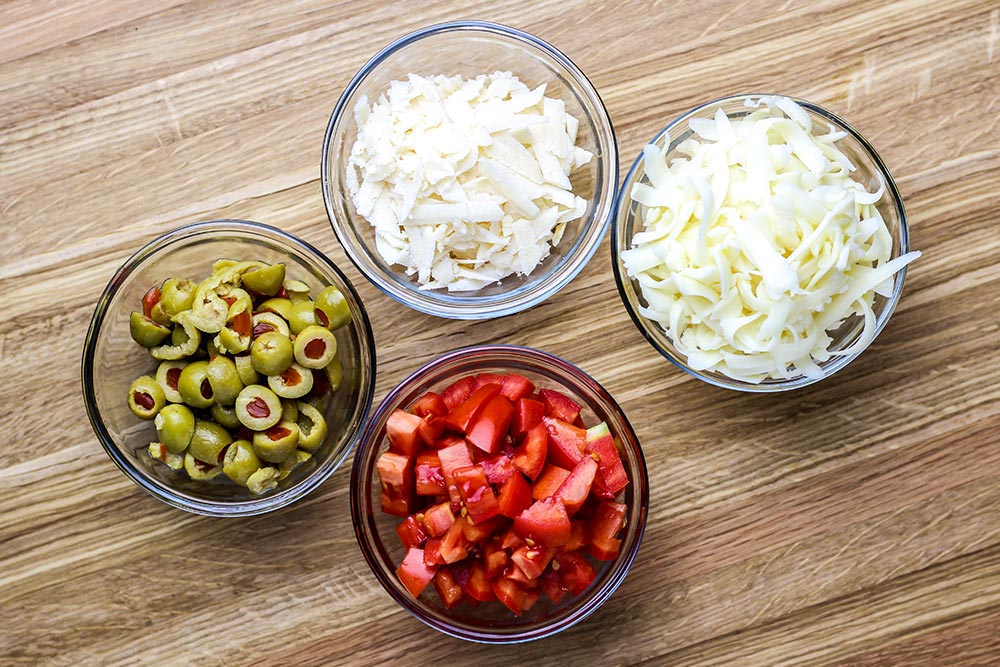 Chopped Tomatoes, Halved Green Olives, Parmesan Cheese & Fontina Cheese