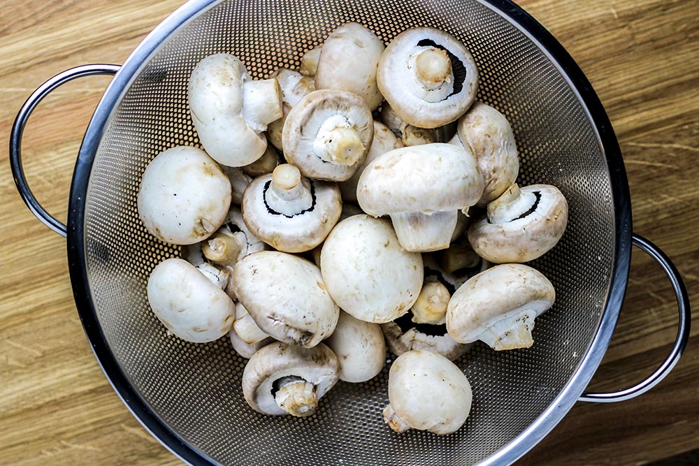 Rinsed Mushrooms in Colander