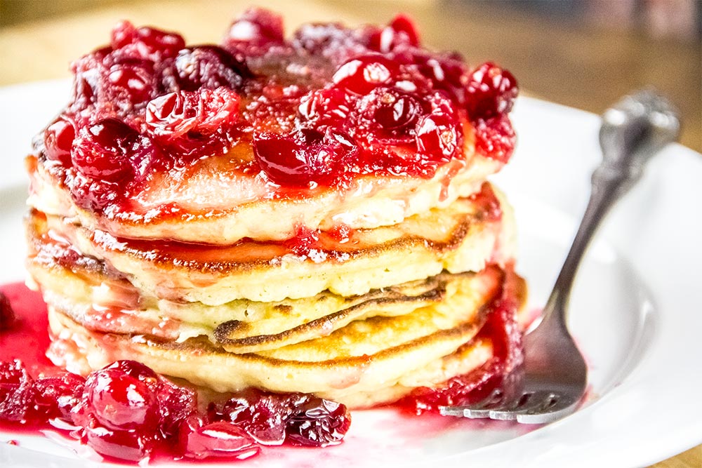 Spiced Eggnog Pancakes with Sweet Cranberry Syrup Recipe