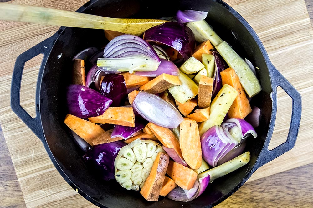 Adding Sweet Potatoes to Dutch Oven