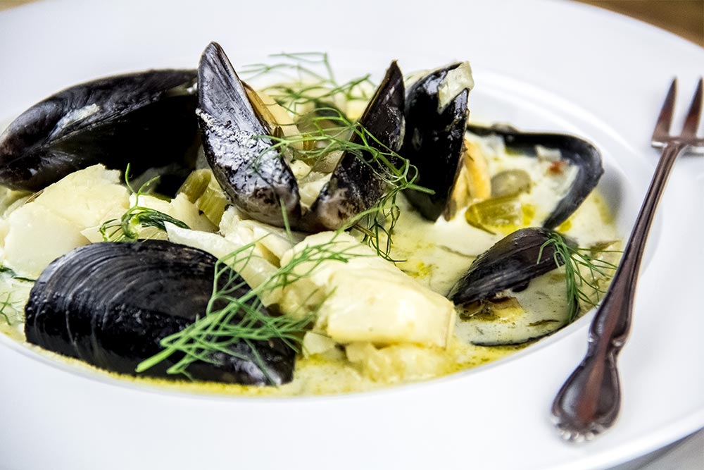 Creamy Seafood Stew in Bowl with Garnish