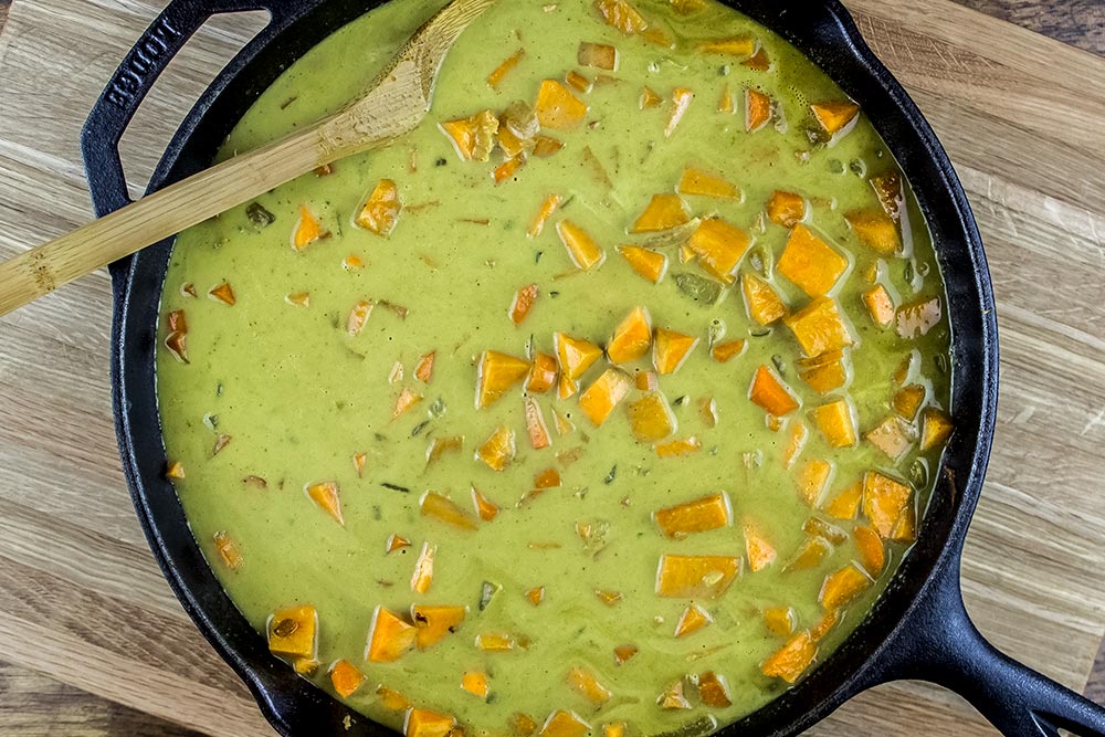 Mixing Coconut Milk into Other Ingredients in Skillet