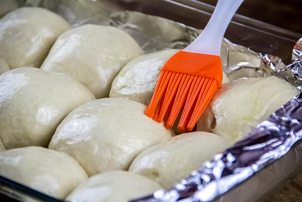 Brushing Egg Wash onto Raw Dough
