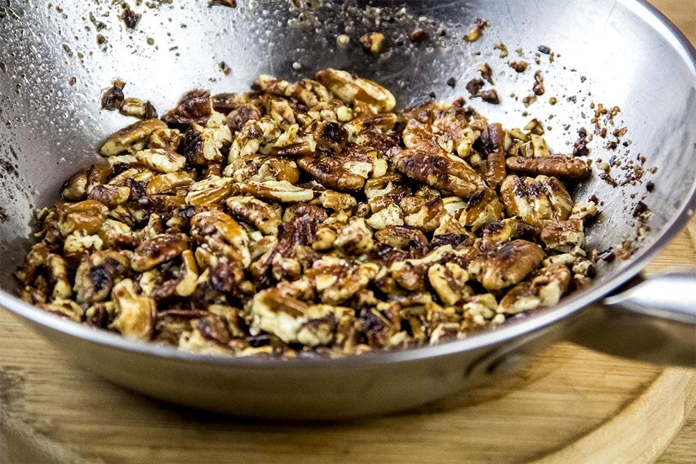 Toasted Pecans with Olive Oil in Small Skillet