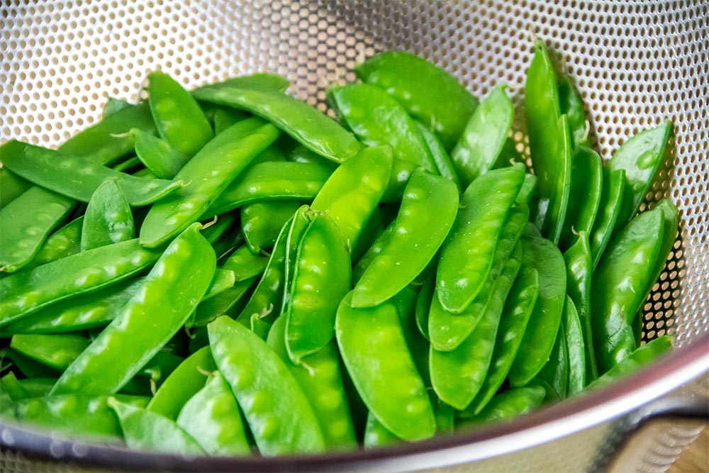 Blanched Snow Peas in Colander