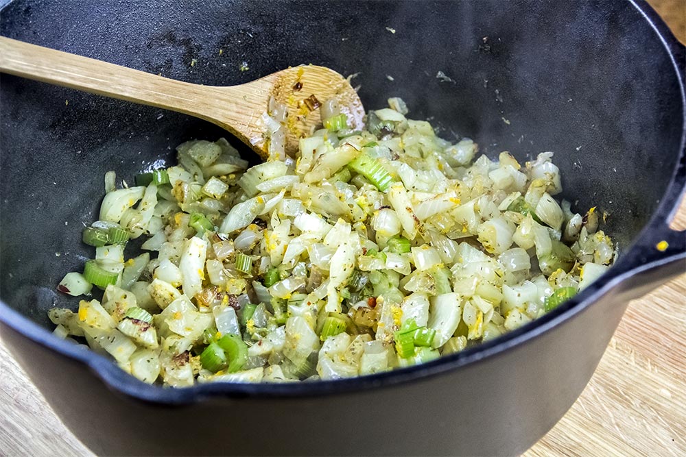 Stirring Ingredients Together in Dutch Oven
