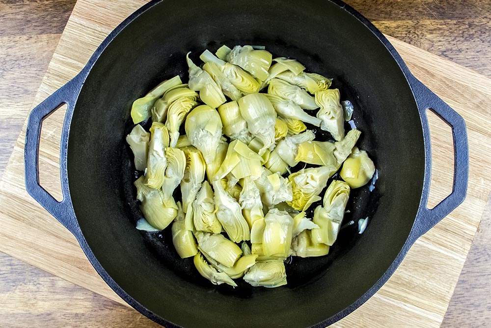 Baby Artichoke Hearts Cooking in Dutch Oven