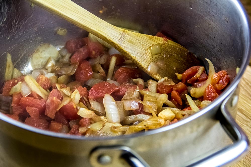Adding Diced Tomatoes to Fennel and Onion Mixture