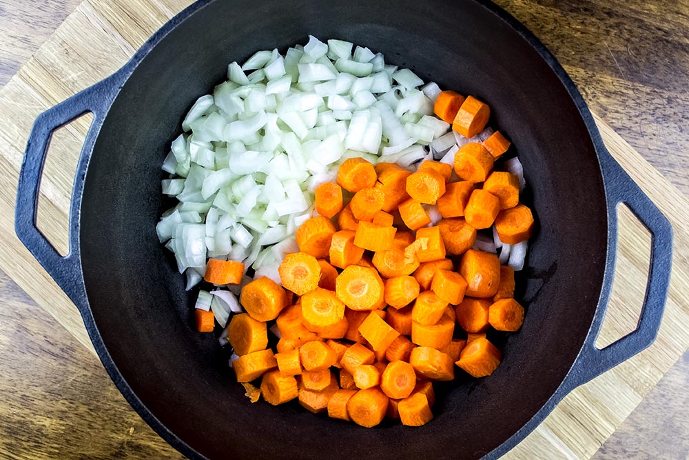 Onions and Carrots in Dutch Oven
