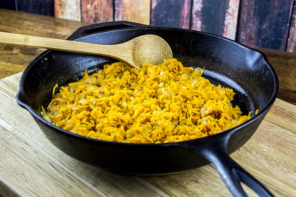 Onions and Sweet Potato in Cast Iron Skillet