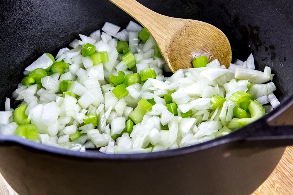 Softening Onions and Celery in Lodge Cast Iron Dutch Oven