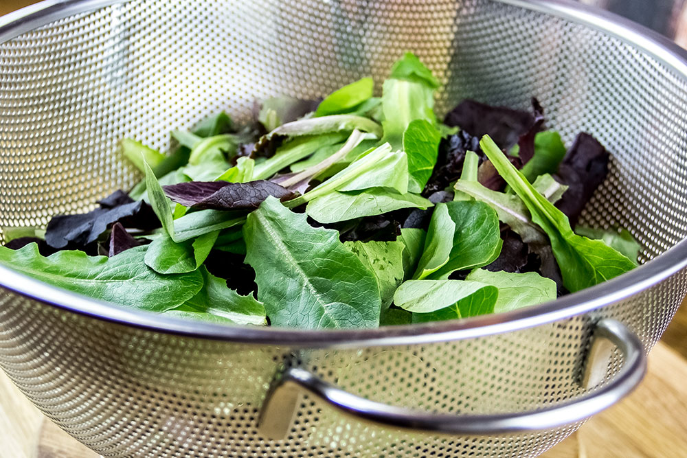 Washing Baby Greens in Colander