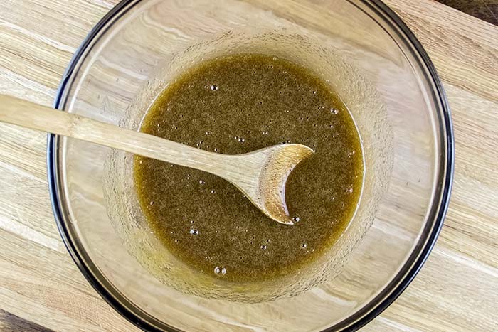 Adding Egg and Vanilla Extract to Brownie Mix