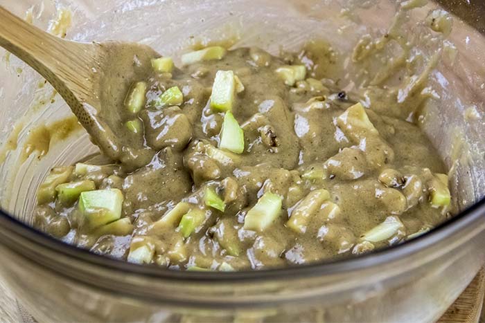 Mixing Zucchini and Nuts into Brownie Mixture