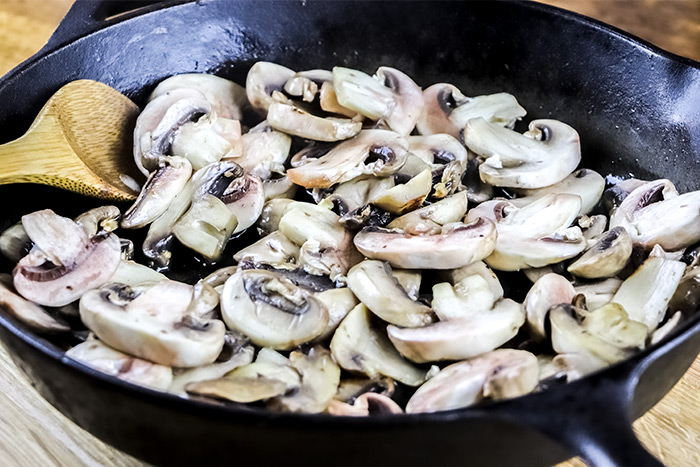 Browning Mushrooms in Cast Iron Skillet