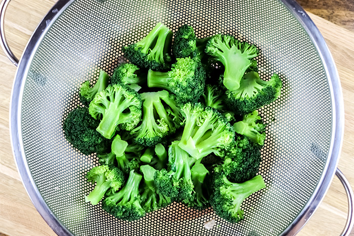 Blanched Broccoli Florets in Colander