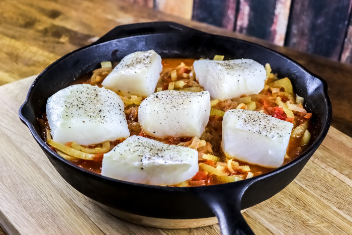 Adding Raw Cod Fish to Cast Iron Skillet