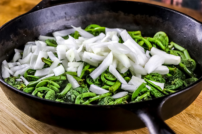 Skillet Containing Fiddleheads