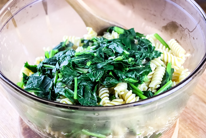Cooked Pasta & Spinach in Large Glass Bowl
