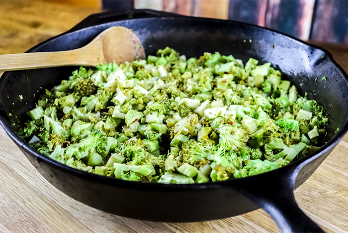 Frying Broccoli Pieces in Cast Iron Skillet