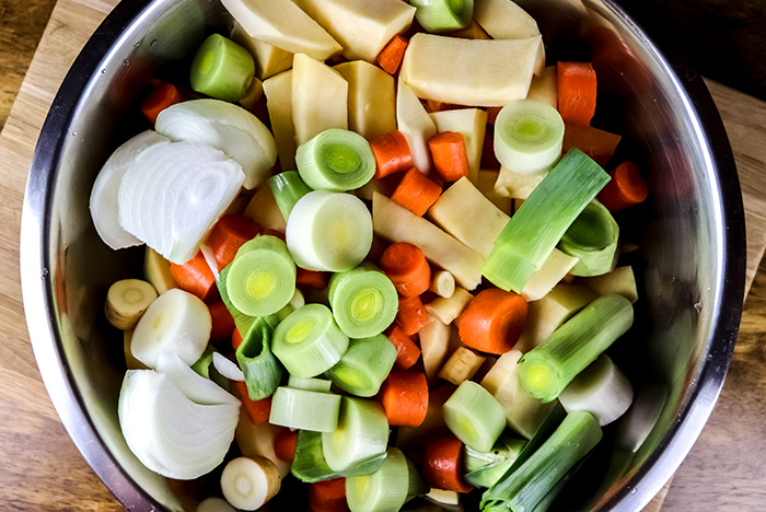 Vegetables in Large Bowl Coated with Olive Oil
