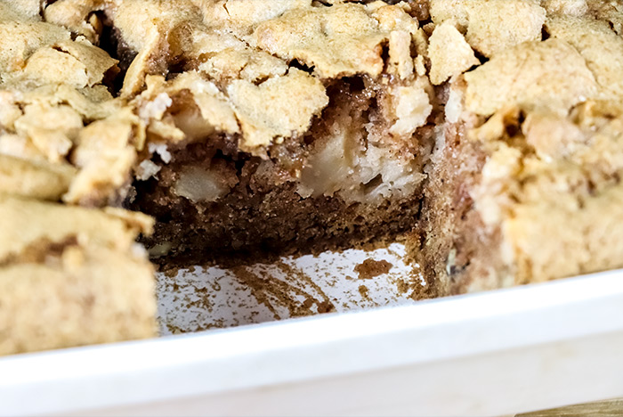 Cutting a Piece From Apple Cake