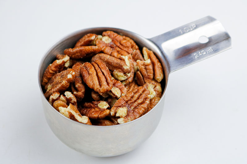 A Measuring Cup Of Pecans